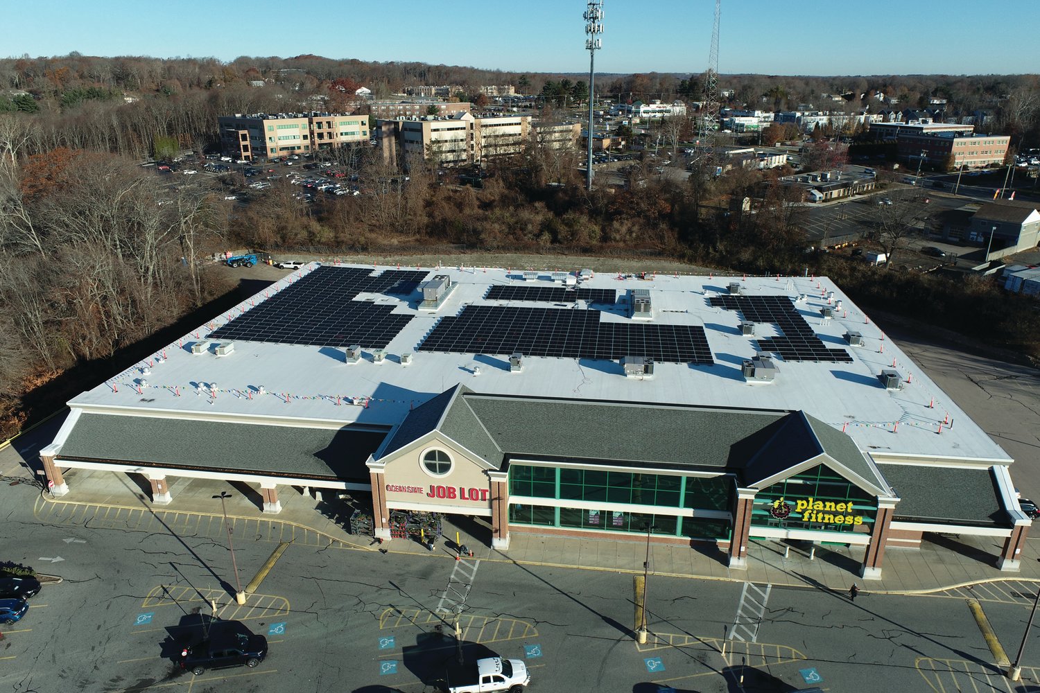 SKY VIEW: A Rhode Island based solar energy company has installed 750 solar panels on the roof of Ocean State Job Lot’s store at 1493 Hartford Ave., in Johnston.